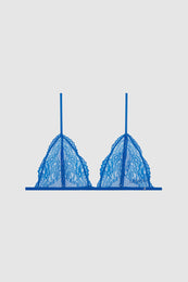 Electric blue lace bra with adjustable straps and a triangular cup design.