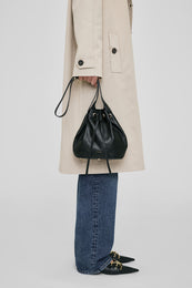 ANINE BING Mini Alana Bucket Bag - Black - On Model Front