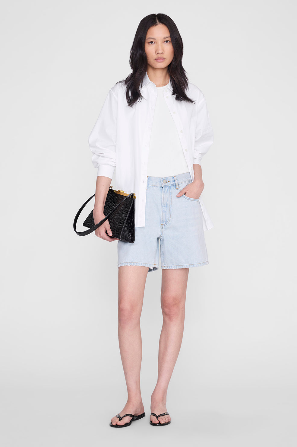 ANINE BING Noelle Thong Sandals - Embossed Black - on model front