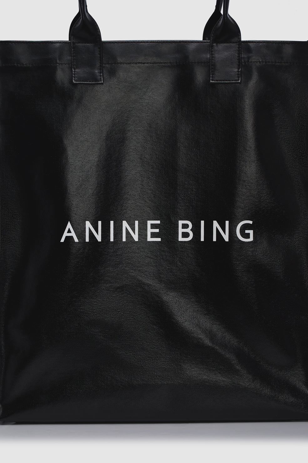 ANINE BING Leonie Coated Canvas Tote - Black - detail view
