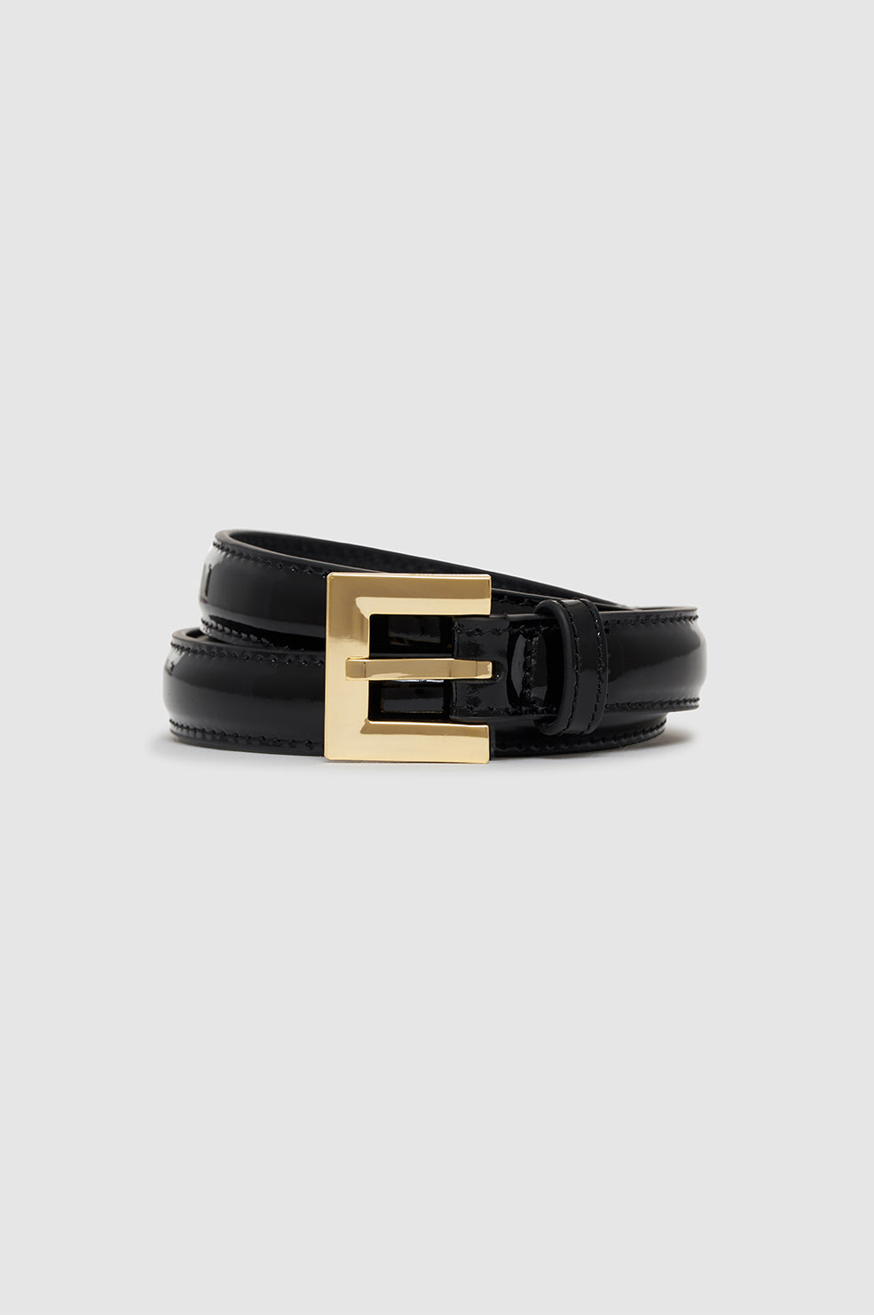 ANINE BING Nicola Belt - Black Patent - Rolled Up View 