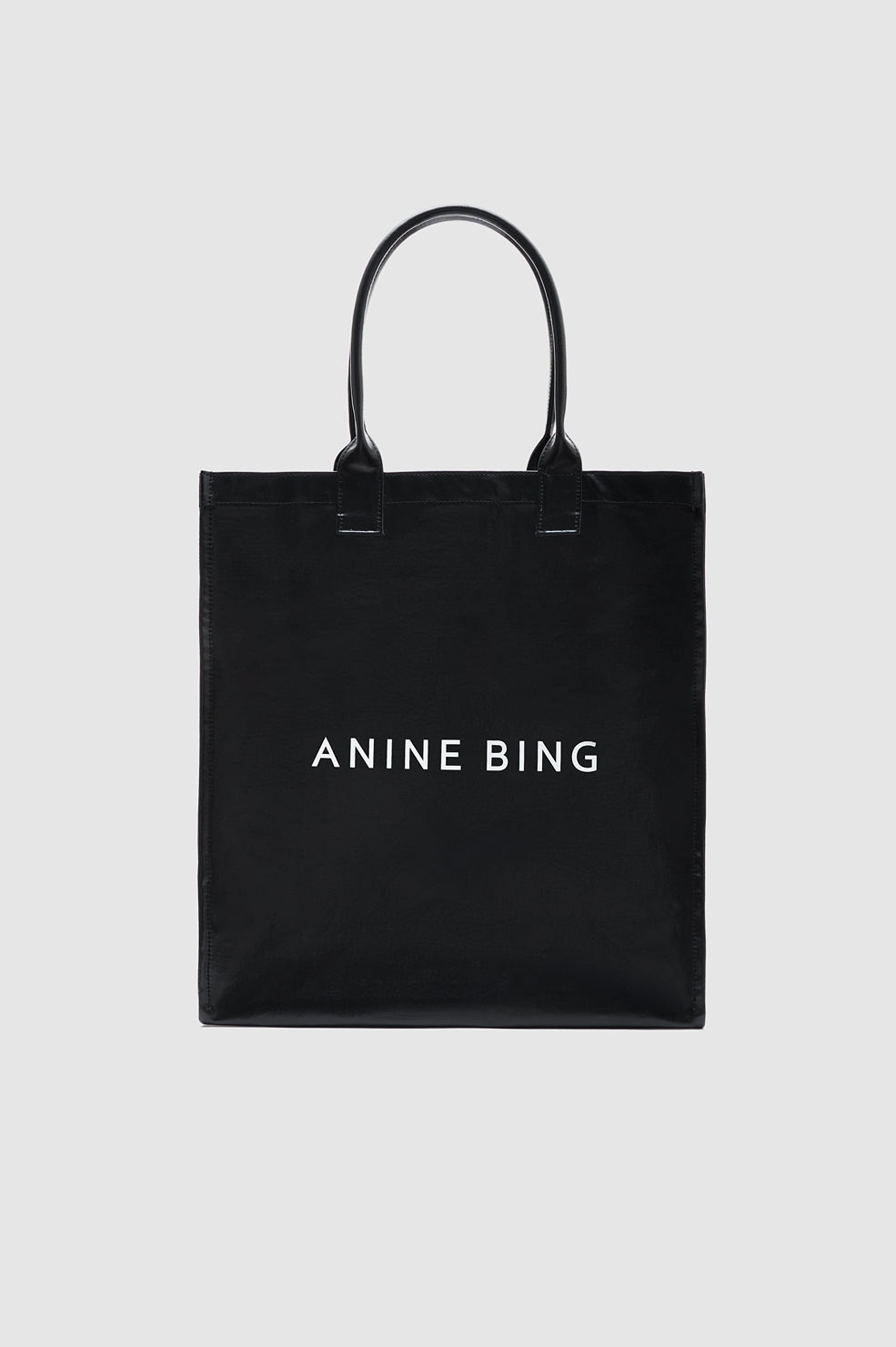 ANINE BING Leonie Coated Canvas Tote - Black - front view
