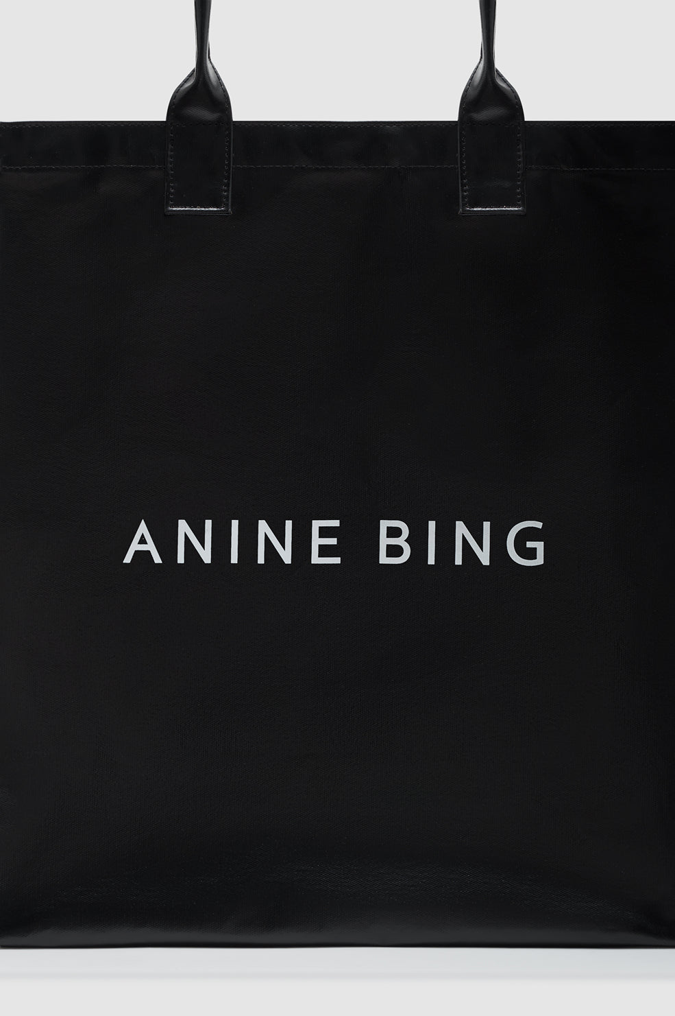 ANINE BING Leonie Coated Canvas Tote - Black - detail view
