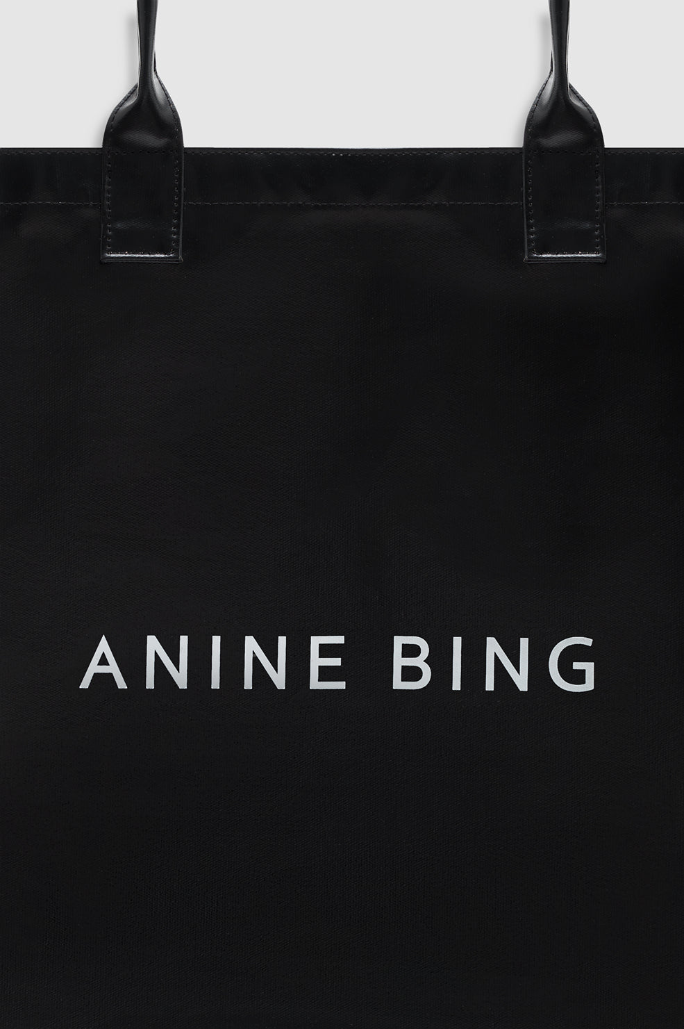 ANINE BING Leo Coated Canvas Tote - Black - detail view