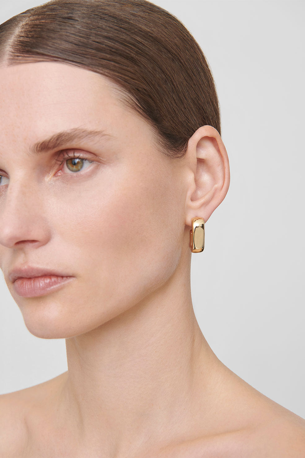 ANINE BING Chunky Hoop Earrings - Gold - On Model View